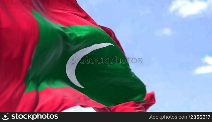 Detail of the national flag of Maldives waving in the wind on a clear day. Maldives is an archipelagic country in the Indian subcontinent of Asia. Selective focus.