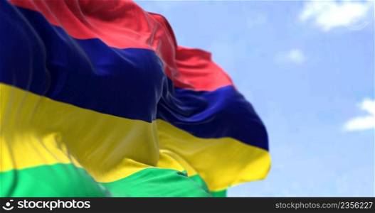 Detail of the national flag of Mauritius waving in the wind on a clear day. Mauritius is an island nation in the Indian Ocean. Selective focus.
