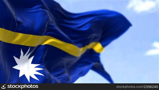 Detail of the national flag of Nauru waving in the wind on a clear day. Nauru is an island country and microstate in Oceania. Selective focus.