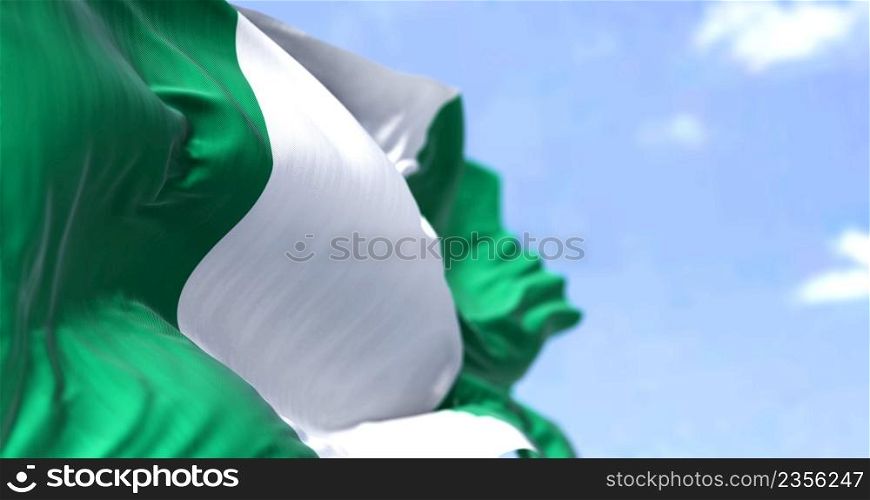Detail of the national flag of Nigeria waving in the wind on a clear day. Nigeria It is the most populous country in Africa. Selective focus.