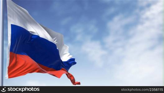 Detail of the national flag of Russia waving in the wind in a clear day. Democracy and politics. Largest country in the world. Selective focus. Seamless Slow motion. Chroma key