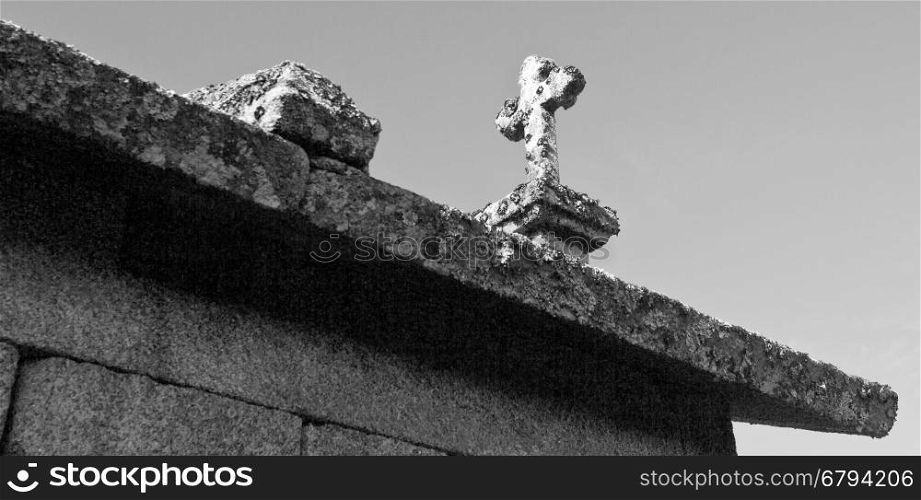 Detail of the of the cross on top of the all the granaries, called espigueiros, in Northern Portugal
