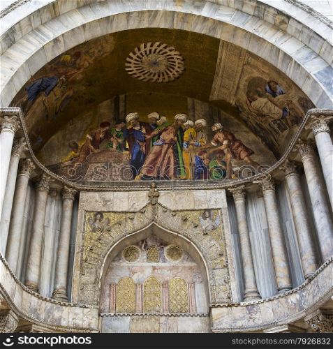 Detail of the ornate outer architecture and paintings of Saint Mark&rsquo;s Basilica in Venice, Italy