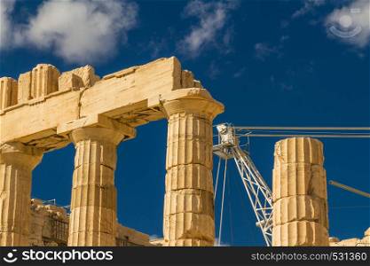 Detail of the Parthenon on the Acropolis with crane in Athens, Greece.