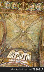 Detail of the presbytery vault, richly decorated with mosaics in green, blue and gold, with vine tendrils and small animals.