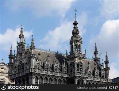 Detail of the roof and statues on Kings House or Breadhouse in Grand Place in Brussels