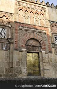 Detail of the Saint Ildefonso gate on the west facade of the Mosque-Cathedral of Cordoba, Spain