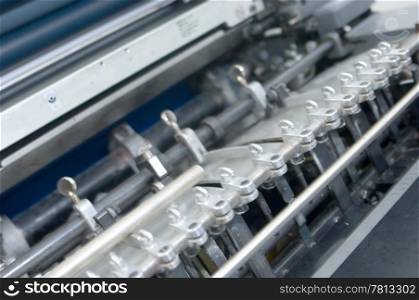 Detail of the sheet feeder of an offset printing press