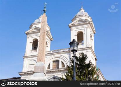Detail of towers on Trinita dei Monti church at top of Spanish Steps in Rome Italy