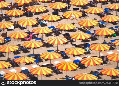 Detail of umbrellas on the beach on the Romagna coast in Italy