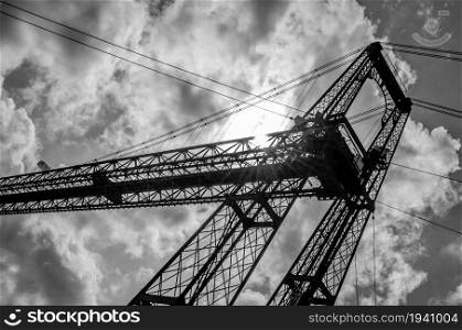Detail of Vizcaya Bridge, a transporter bridge that links the towns of Portugalete and Getxo, Spain, built in 1893, declared a World Heritage Site by UNESCO. Black and white image