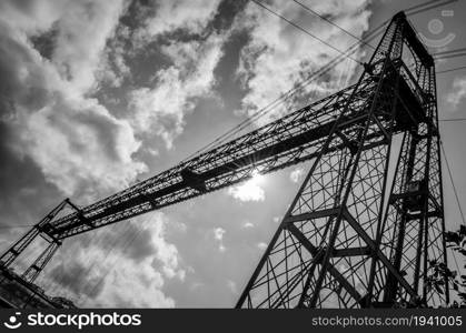 Detail of Vizcaya Bridge, a transporter bridge that links the towns of Portugalete and Getxo, Spain, built in 1893, declared a World Heritage Site by UNESCO. Black and white image