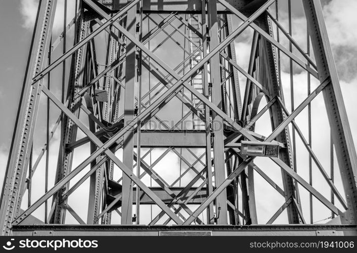 Detail of Vizcaya Bridge, a transporter bridge that links the towns of Portugalete and Getxo, Spain, built in 1893, declared a World Heritage Site by UNESCO. Black and white image