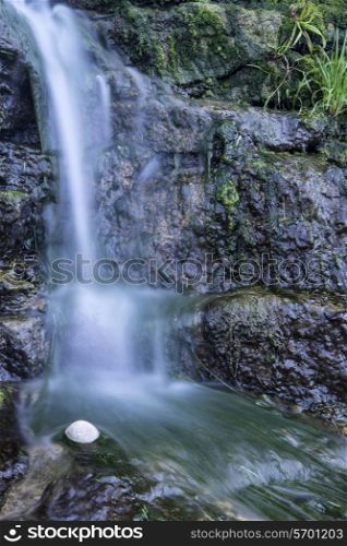 Detail of waterfall flowing onto rocks