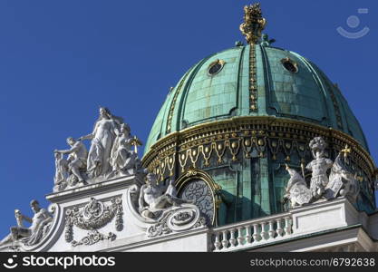 Detail on the roof of the Hofburg Palace in Vienna, Austria. The Hofburg Palace is the former imperial palace which forms the official residence and workplace of the President of Austria. Built in the 13th century and expanded in the centuries since, the palace has housed some of the most powerful people in European and Austrian history, including monarchs of the Habsburg dynasty and rulers of the Austro-Hungarian Empire.