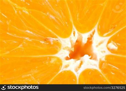 Detail texture of fresh orange fruit, radiate lines on background