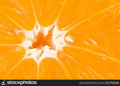 Detail texture of fresh orange fruit, radiate lines on background