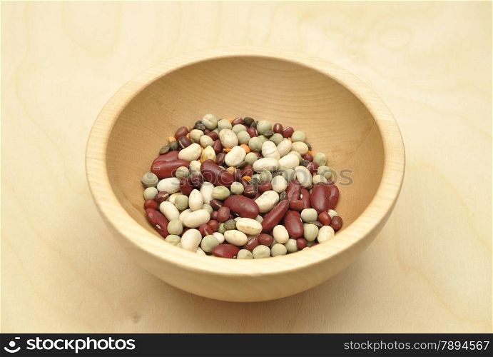 Detailed but simple image of legumes on wood