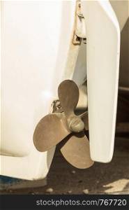 Detailed close up of white boat propeller. Details of nautical vessel sailing objects concept.. Close up of white boat propeller