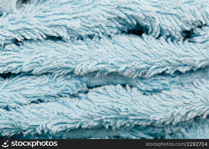 Detailed closeup of blue towel fabric surface. Patterns, textures and background concept.. Detailed closeup of blue towel fabric