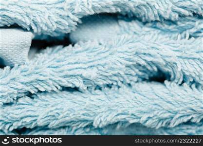 Detailed closeup of blue towel fabric surface. Patterns, textures and background concept.. Detailed closeup of blue towel fabric
