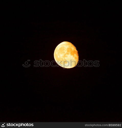 Detailed image of near full blood red super moon with copy space