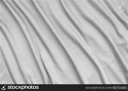 Detailed polyester white fabric texture with many long folds. Detailed polyester white fabric texture with many folds