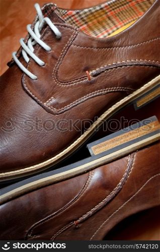 Details of brown shoes for men