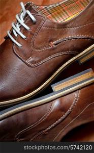 Details of brown shoes for men
