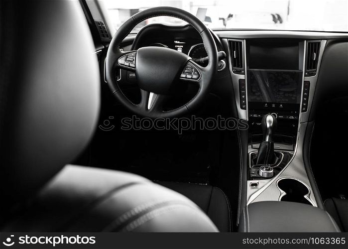 details of the car interior, black leather interior. details of stylish car interior, leather interior