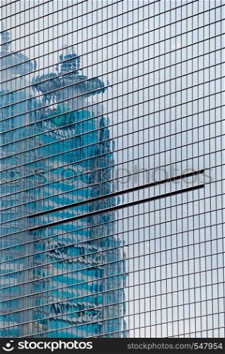 details of the facade of a modern skyscraper made of glass and steel closeup. Shanghai World Financial Center.. details of the facade of a modern skyscraper made of glass and steel closeup. Shanghai World Financial Center