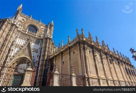 Details of the facade of the cathedral of Santa Maria La Giralda in Seville, Spain