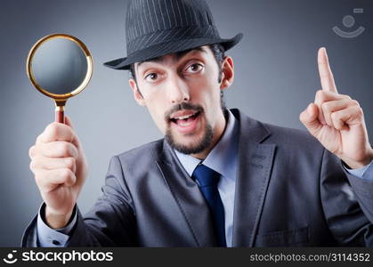 Detective and magnifying glass