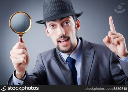 Detective and magnifying glass