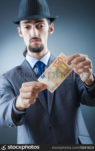 Detective looking at fake money