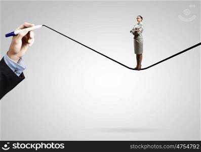 Determined businesswoman. Young confident businesswoman standing on drawn line