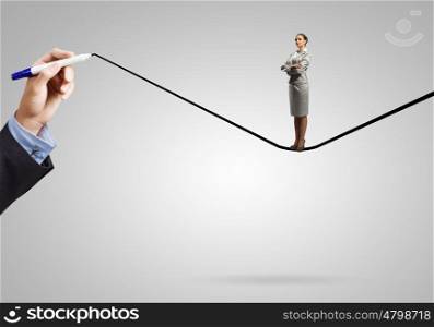 Determined businesswoman. Young confident businesswoman standing on drawn line