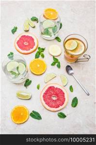 detox beverage concept  the and infused water with lime,grapefruit,citrus,lemon and mint on marble background
