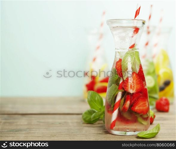 Detox fruit infused flavored water. Refreshing summer homemade cocktail