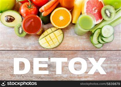 detox, healthy eating, food and diet concept - close up of fresh juice glass and fruits on table