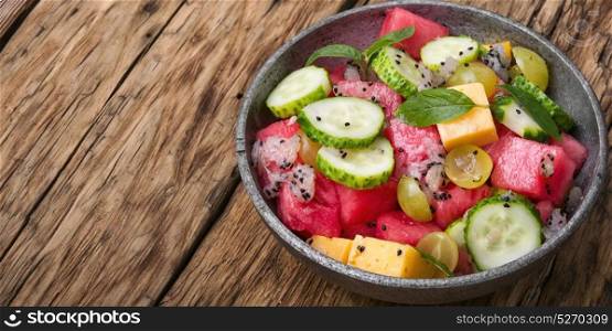detox salad with watermelon. vegetarian fruity salad with watermelon,cucumber and grapes
