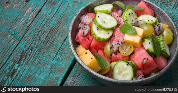 detox salad with watermelon. vegetarian fruity salad with watermelon,cucumber and grapes