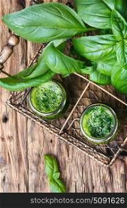detox smoothies with basil. Freshly blended green basil smoothie in glass jar