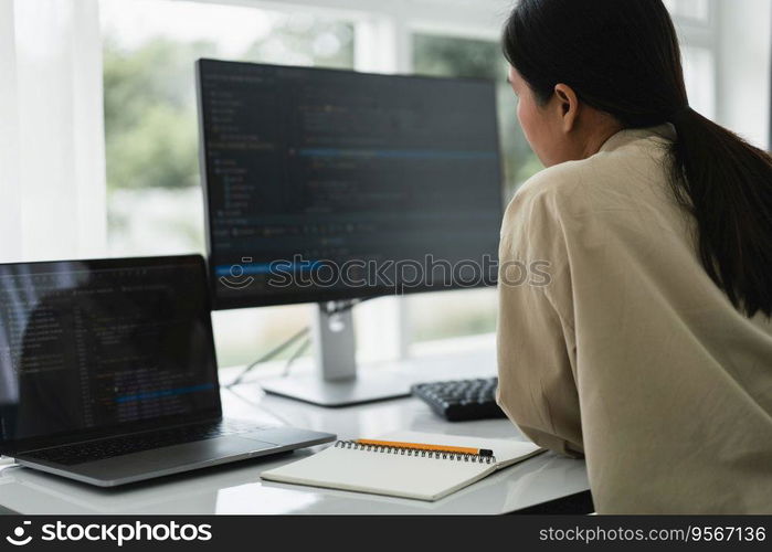 Developer programmer checking code on monitor while programming to developing web and application.