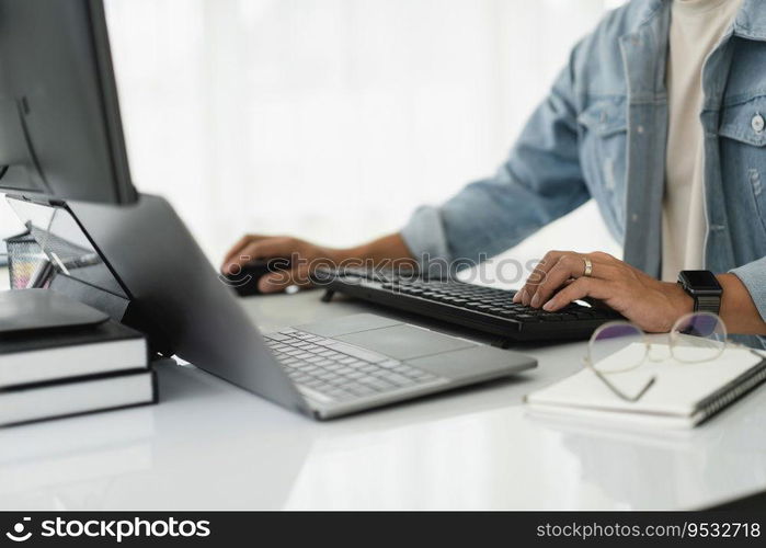 Developer programmer checking code on multiple monitor while programming to developing web and apps.