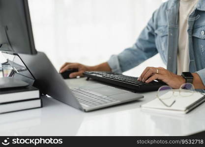 Developer programmer checking code on multiple monitor while programming to developing web and apps.