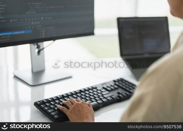 Developer programmer programming code to developing website and application in software office.