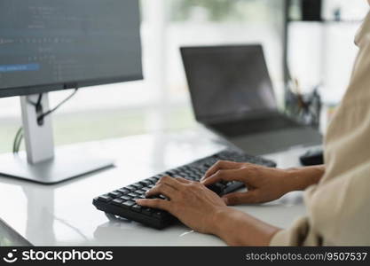 Developer programmer programming code to developing website and application in software office.