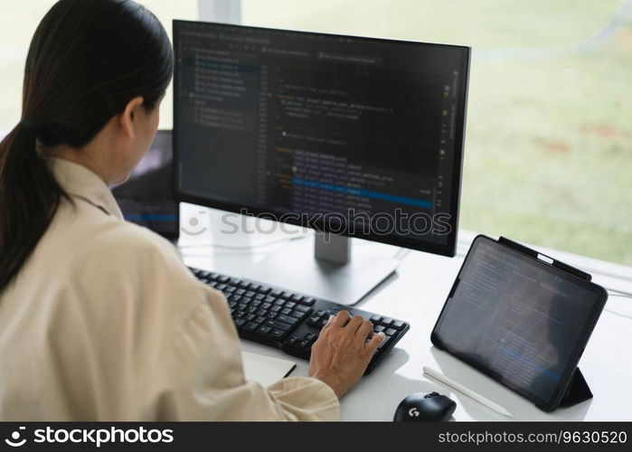 Developer programmer typing code on keyboard for programming to developing web and application.