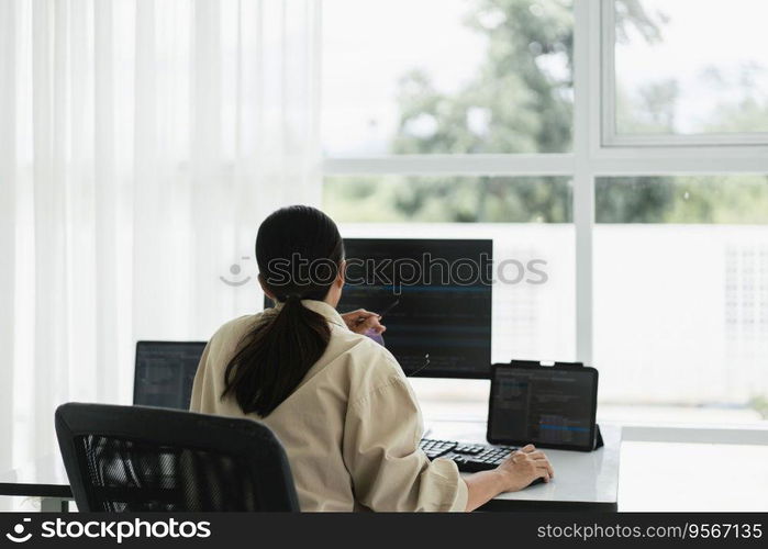 Developer programmer use mouse and checking code on laptop while programming to developing website.